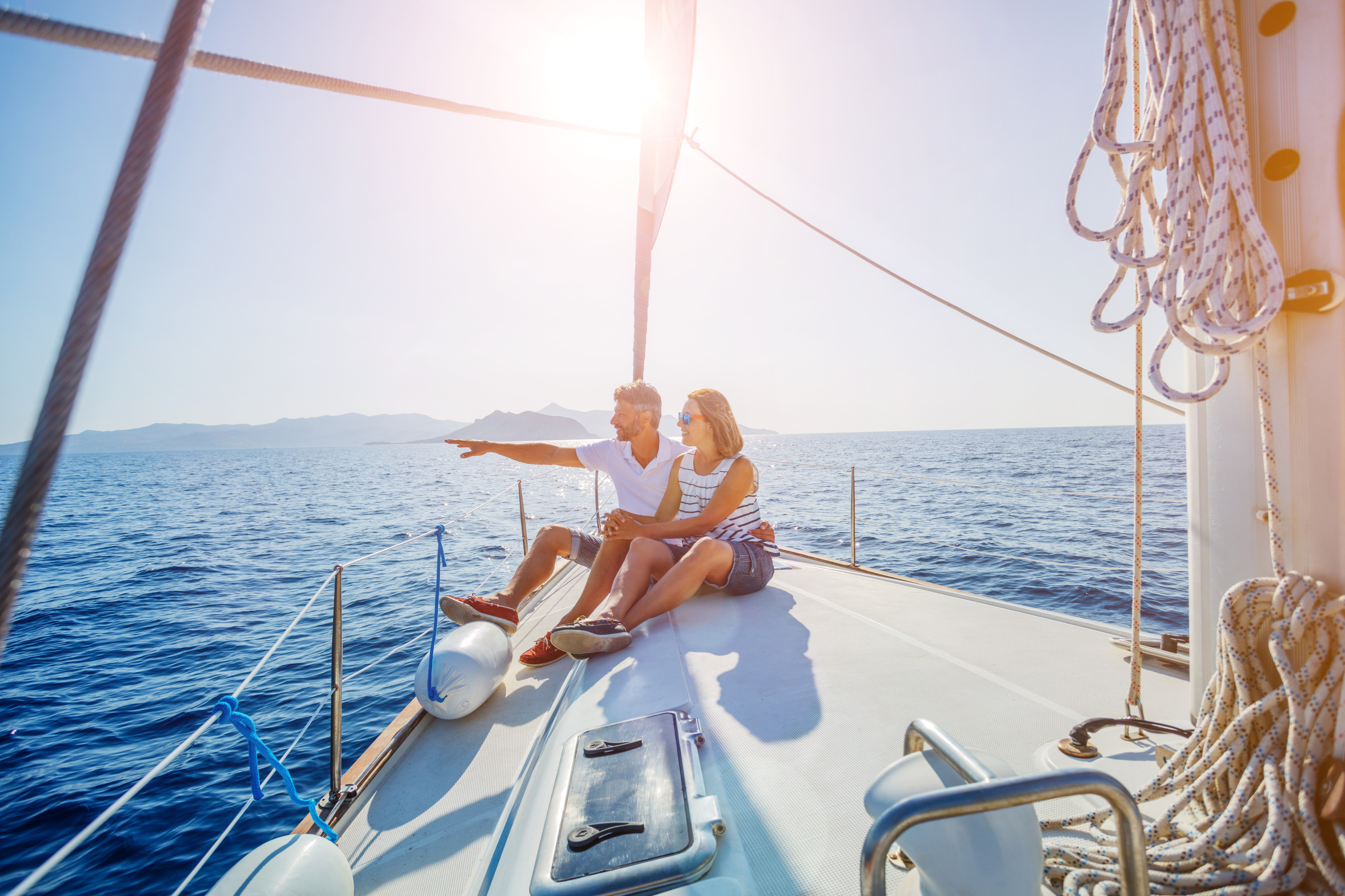 Young couple relaxing on the yacht